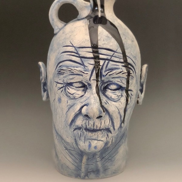 Blue old man face jug