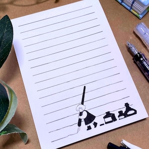 May include: A white ceramic mug with a black handle and the text "But First, Coffee" in a handwritten style. The mug is on a white surface. The mug is approximately 4 inches tall.