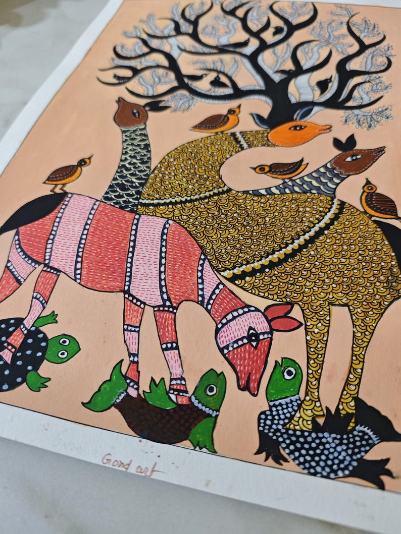 May include: A colorful Gond art painting featuring stylized animals and birds under a tree. The animals have patterned bodies in red, yellow, and black. Small green turtles are at the bottom. The background is a light peach color.