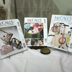3 patrones de accesorios de moda McCalls nuevos en paquete: bolsos, carteras, bolsos de mano, flores n.° E929