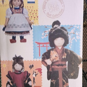 May include: A vintage Vogue Craft doll pattern featuring three dolls in different cultural outfits. The dolls are wearing a Dutch, Japanese, and Spanish inspired outfits. The pattern is titled "Vogue Craft Doll Collection" and is designed by Linda Carr.