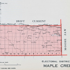 May include: A black and white map of the electoral district of Maple Creek, Saskatchewan, Canada. The map shows the boundaries of the district, as well as the names of the towns and villages within the district. The map is divided into squares, each representing a township. The map is labeled with the scale of 18 miles to an inch.