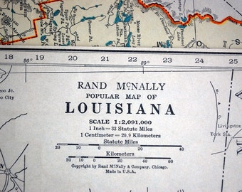 Könnte beinhalten: Eine Vintage-Karte von Louisiana von Rand McNally mit einem Maßstab von 1:2.091.000. Die Karte enthält einen Maßstab von 1 Zoll zu 33 Meilen oder 1 cm zu 20,9 Kilometern. Die Karte ist in Schwarzweiß mit Farbakzenten gedruckt.