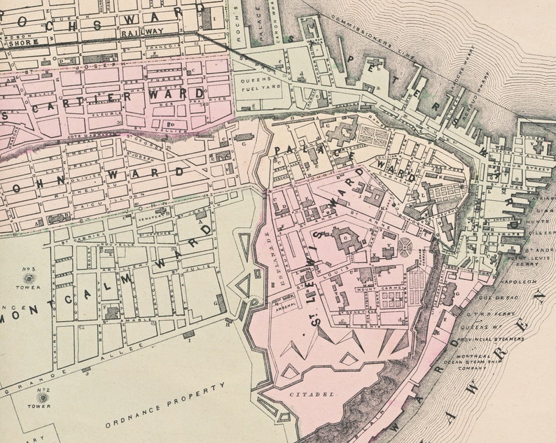 May include: A vintage map of Quebec City, Canada, showing the city's layout and street names. The map is in black and white with some areas highlighted in pink. The map includes the names of the different wards, including "John Ward", "Cartier Ward", "Palace Ward", and "St. Louis Ward".