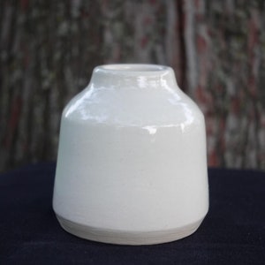 White angular ceramic bud vase