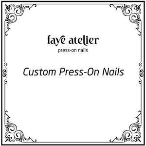 May include: A white background with a black decorative border and corner accents. The text "faye atelier press-on nails" is at the top, with "Custom Press-On Nails" in a larger font below. The design suggests a beauty product.