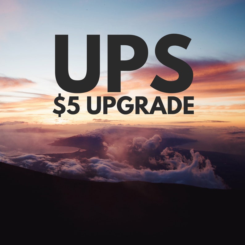 May include: Image with the word "UPS" in large, bold, black letters at the top, and "$5 UPGRADE" in smaller, black letters below. The background is a scenic view of clouds and a sunset.