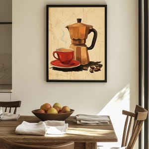 Può includere: Una stampa artistica incorniciata raffigurante una caffettiera moka dorata, una tazzina da caffè rossa su piattino con vapore che sale e chicchi di caffè marrone scuro sparsi. L'illustrazione è su uno sfondo beige chiaro con venature del legno.