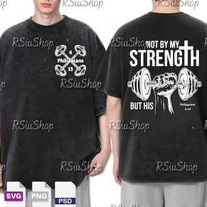 May include: Black t-shirt with a distressed look. The front features a dumbbell design with the text "Philippians 4:13". The back displays a cross and a hand holding a dumbbell, with the text "NOT BY MY STRENGTH BUT HIS".
