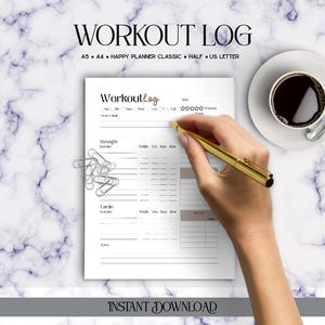 May include: A workout log with the title "Workout Log" in a handwritten style. The log includes sections for strength, cardio, and notes. A hand holds a gold pen over the log. A cup of coffee sits on a saucer in the upper right corner.