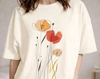 Camiseta com estampa de papoula, presente para a mulher que ama flores silvestres, um look boho descomplicado que você vai querer usar sempre, camiseta minimalista com estampa de flores silvestres.