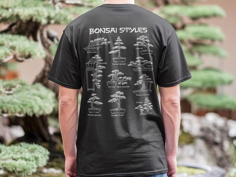 May include: A black t-shirt featuring a white graphic on the back titled Bonsai Styles. The print displays nine distinct tree shapes with labels including Windswept, Cascade, Formal Upright, Leaning, Raft, Semi-cascade, Root-over-rock, Informal Upright, and Double Trunk.