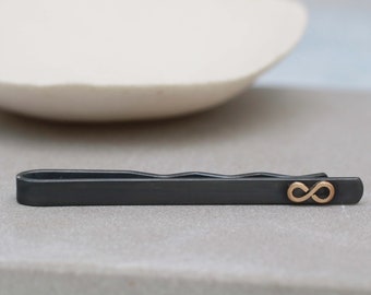 Black And 9ct Gold Tie Clip With Infinity Symbol