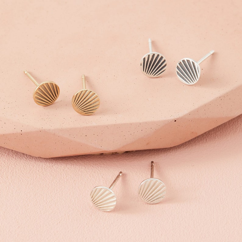 tiny stud earrings available in silver or gold