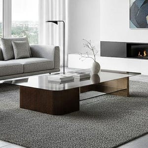 May include: Modern living room with a gray sofa, two armchairs, and a coffee table. A large abstract painting hangs above a fireplace. The room features large windows with a city view, a gray rug, and a minimalist design.