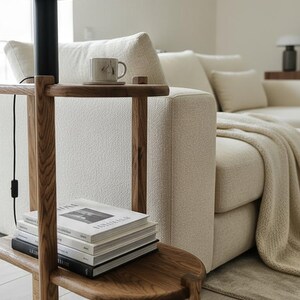 Handcrafted solid oak end table with a minimalist two-tier design. Made from natural oak wood - finished with linseed oil for a smooth - eco-friendly touch. Compact - functional, perfect for small spaces, bedrooms, living areas. Handgefertigter Nachttisch aus massivem Eichenholz mit minimalistischem zweistufigem Design. Gefertigt aus natürlicher Eiche, mit Leinöl veredelt für eine glatte, umweltfreundliche Oberfläche. Kompakt und funktional, ideal für kleine Räume, Schlafzimmer - Wohnbereiche.