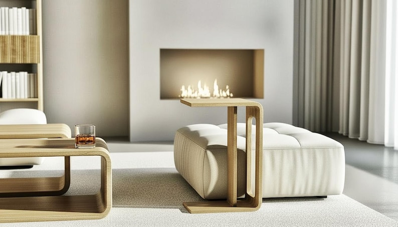 Perfect for modern living rooms, this minimalist C-form side table is handcrafted from solid oak. Features smooth wheels and a built-in magazine rack for ultimate convenience.