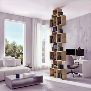 May include: A modern living room with a unique, geometric bookshelf filled with books. The bookshelf is made of light-colored wood and is positioned vertically. A white sofa, coffee table, and desk with a computer complete the contemporary design.