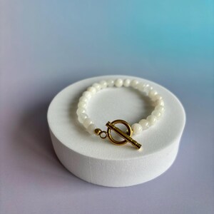 Natural white angelite pearl bracelet and stainless steel clasp