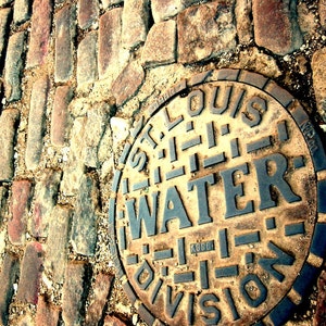 St. Louis, MO  Water Division 8 X 10 Color Photograph, Manhole Cover, Cobblestone street
