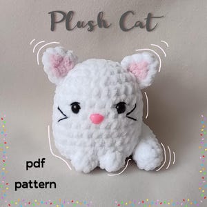 May include: A white plush cat crochet pattern in PDF format. The cat has pink ears and a black nose. The text "Plush Cat" is written above the cat.