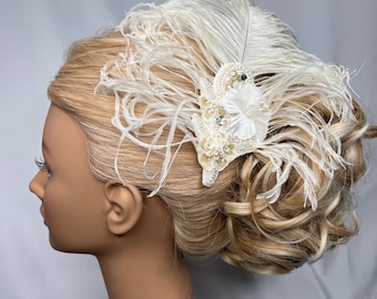 Strut your stuff wearing this lovely, Ivory Ostrich Feather Fascinator Hair Clip with Vintage Jewels by The House of Kat Swank.