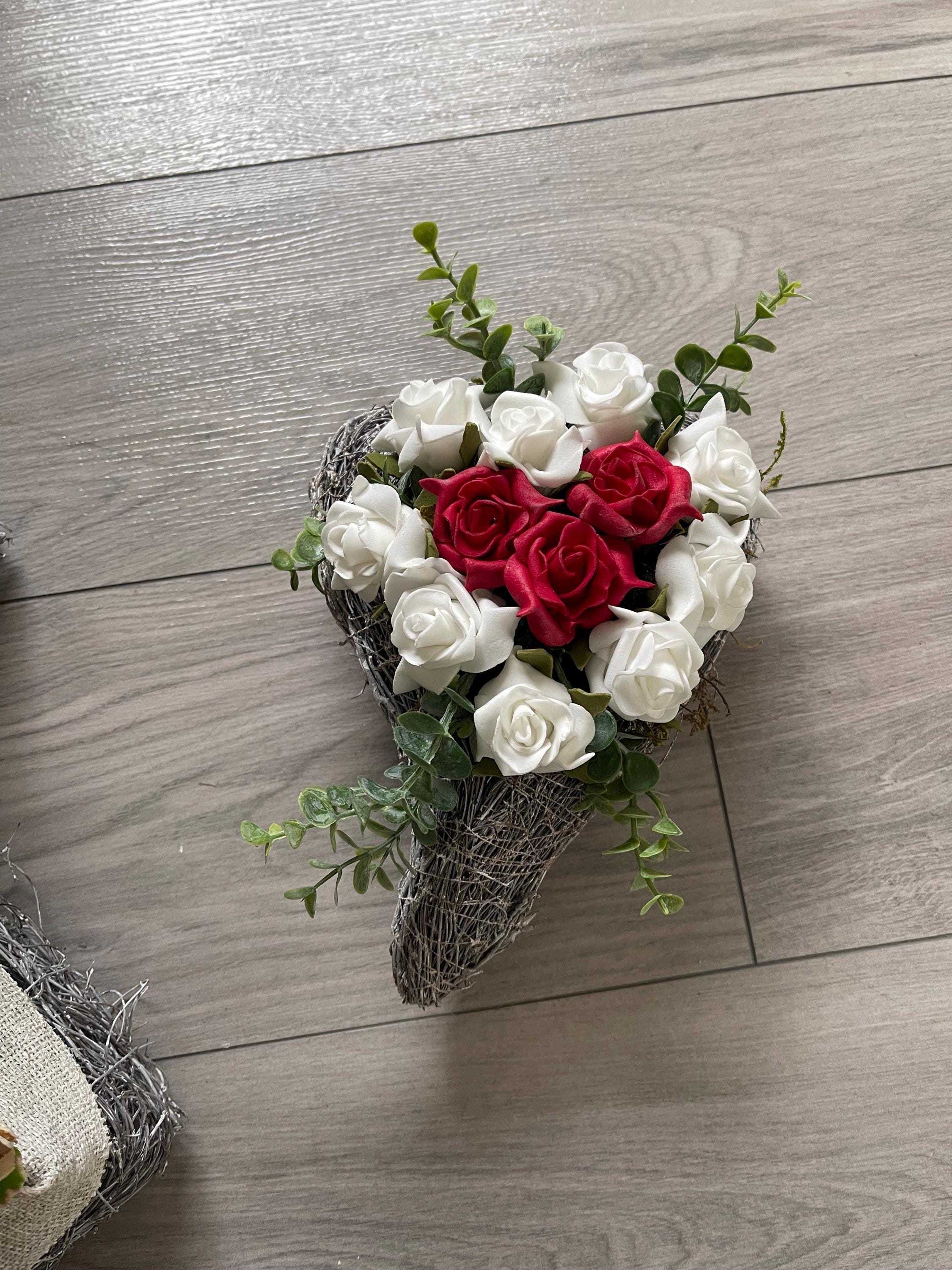 Grabgesteck urnengrab blumenarrangements
