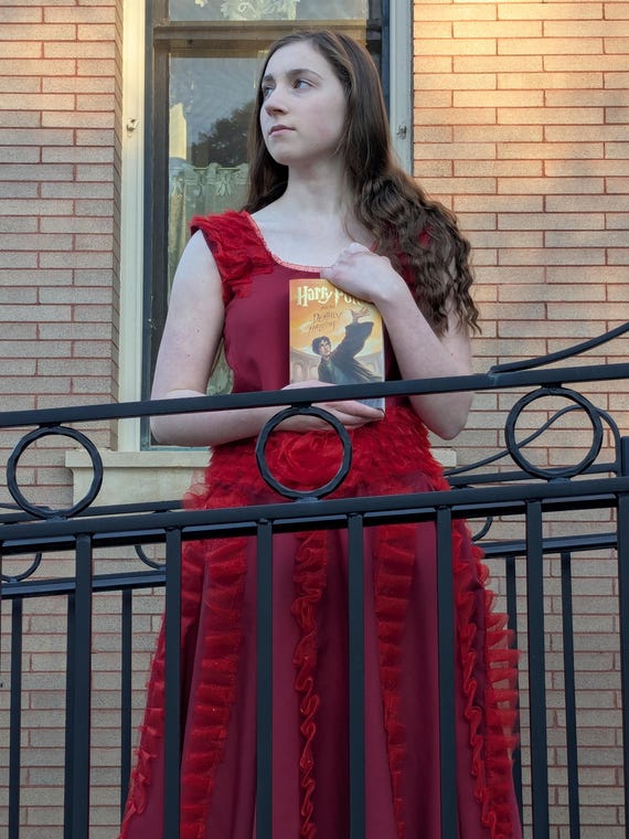 hermione granger red dress deathly hallows Harry Potter | Wizarding fashion icons: ranked