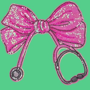 May include: A pink sequined bow with a stethoscope attached. The stethoscope is made of silver and has a black earpiece.