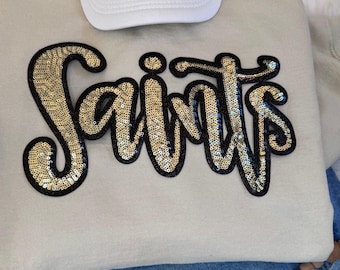Saints-patch met pailletten: zwarte glitter opstrijkappliqué, schoolmascotte