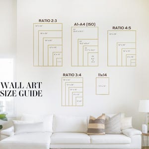 a living room with a white couch and a white wall