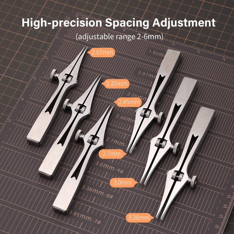 May include: Set of six silver metal spacing tools with adjustable ranges from 2.07 mm to 3.38 mm. The tools are laid out on a black grid background.
