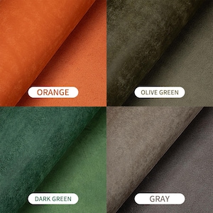 May include: A square image showcasing four fabric swatches in orange, olive green, dark green, and gray. Each swatch is labeled with its respective color name in a white oval. The fabrics appear to have a soft, suede-like texture.