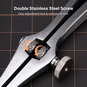 May include: Close-up of a silver compass with a double stainless steel screw adjustment lock. The screw is designed to prevent rust.