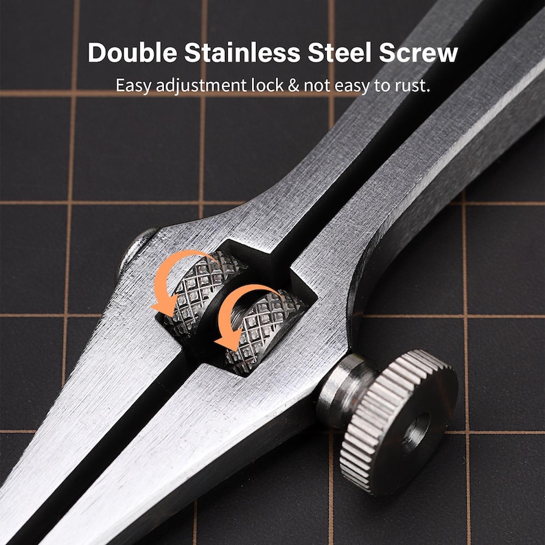 May include: Close-up of a silver compass with a double stainless steel screw adjustment lock. The screw is designed to prevent rust.