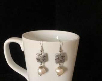 Stamped aluminum and large pearl earrings