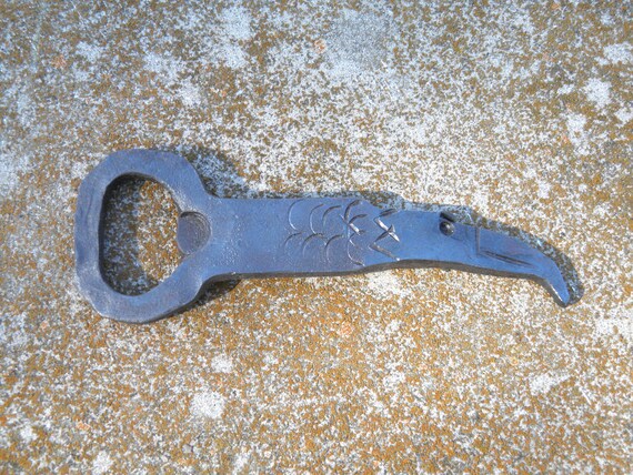 A hand-forged blacksmith eagle head in wrought iron — functional folk art that doubles as a serious conversation piece on any bar cart.