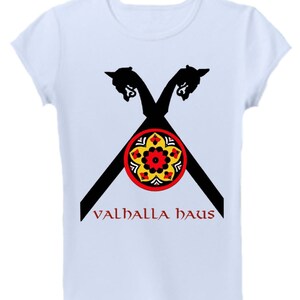 May include: White t-shirt with a black and red design of two crossed Viking ship prows with a yellow and red circular design in the center. The text "VALHALLA HAUS" is printed in red below the design.