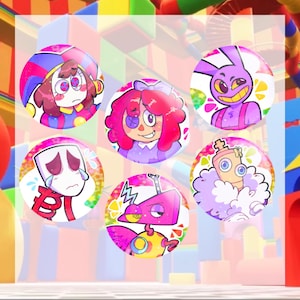 May include: A collection of six colorful, round pinback buttons featuring cartoon character designs. The buttons showcase various characters with distinct features, including a jester, a robot, and a crying figure. The color palette includes pink, purple, yellow, and blue.