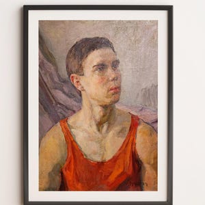 May include: Framed portrait of a person in a red tank top. The painting features a person with short brown hair, looking off to the side. The artwork is set against a muted background and framed in a black border.