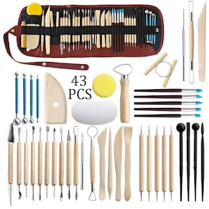 May include: A 43-piece pottery and sculpting tool set. The set includes various tools with wooden and metal handles, brushes, sponges, and a brown leather-like roll-up case for storage. The tools are designed for shaping and detailing clay.