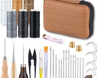 May include: A comprehensive sewing kit featuring a range of tools and materials. Includes spools of thread in various colours, needles, scissors, thimbles, and a measuring tape. The kit is stored in a brown, zipped case.
