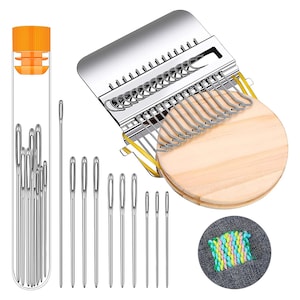 May include: A set of embroidery needles in a clear plastic container, a wooden embroidery hoop, and a metal needle threader. The threader has a wooden handle and a metal needle holder. The needles are arranged in a row and are all the same size. The embroidery hoop is made of wood and has a metal ring around the outside. The needle threader is made of metal and has a wooden handle.