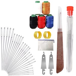 May include: A sewing kit with various supplies. The kit includes spools of white, orange, black, red, and blue thread, along with a needle threader, thimbles, needles, and other sewing tools. The items are arranged on a white background.