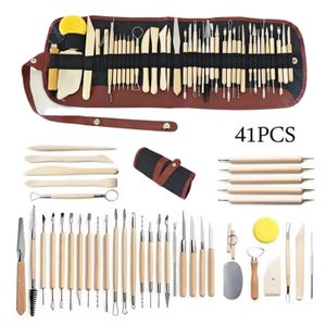 May include: A collection of 41 pottery and sculpting tools, including wooden modeling tools, metal tools, sponges, and rolling pins. The tools are displayed in a brown leather-like roll-up case and arranged on a white background.