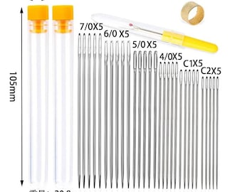 May include: A sewing kit with various needles, a seam ripper, and a thimble. The kit includes needles of different sizes, stored in clear tubes with yellow caps. The tubes are 105mm tall and 12mm wide. The total weight is 20.8g.