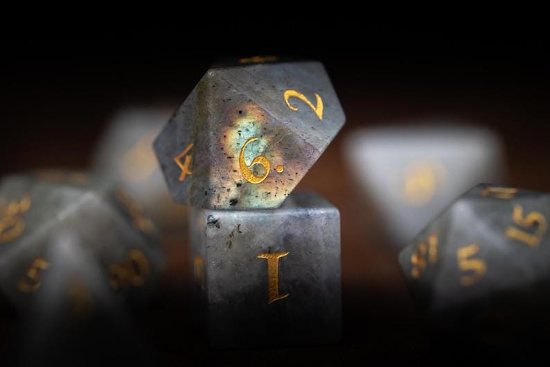 gray and white dnd dice