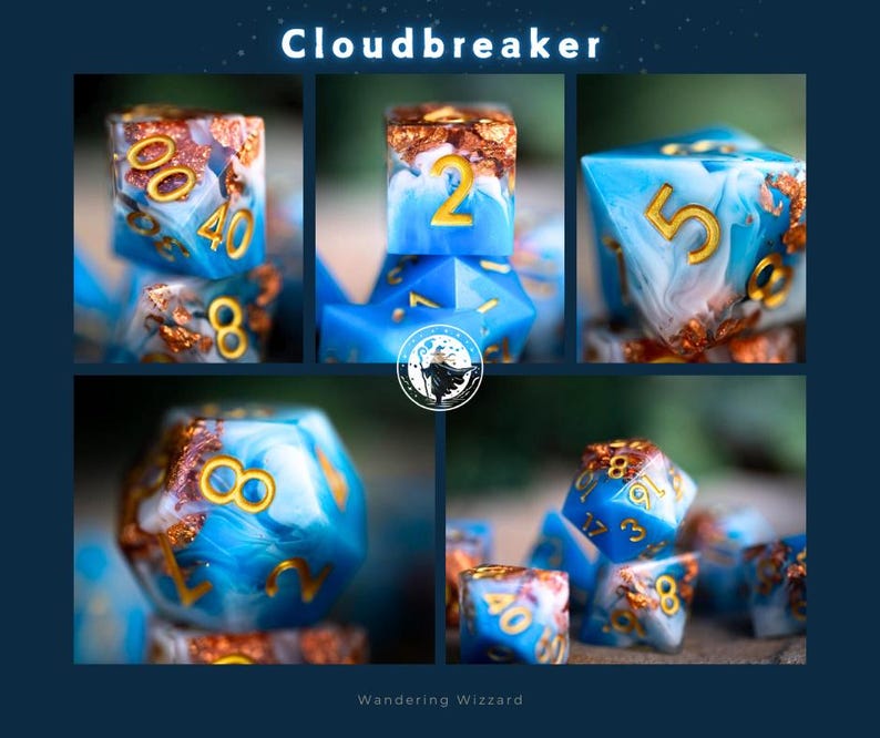 May include: A set of blue and white dice with gold accents and swirling patterns. The dice are numbered 1 through 6. The dice are labeled "Cloudbreaker".
