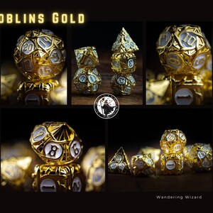 May include: A collection of gold-colored polyhedral dice with white numbering. The dice are displayed in a collage with the text "GOBLINS GOLD" at the top and "Wandering Wizard" at the bottom. The dice are for tabletop games.