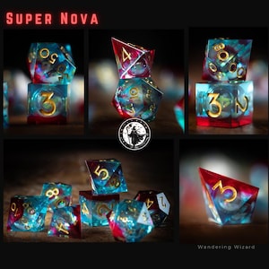 May include: A selection of Super Nova dice sets. The dice are a mix of blue, red, and gold. The text "SUPER NOVA" is at the top of the image. The text "Wandering Wizard" is at the bottom right of the image.